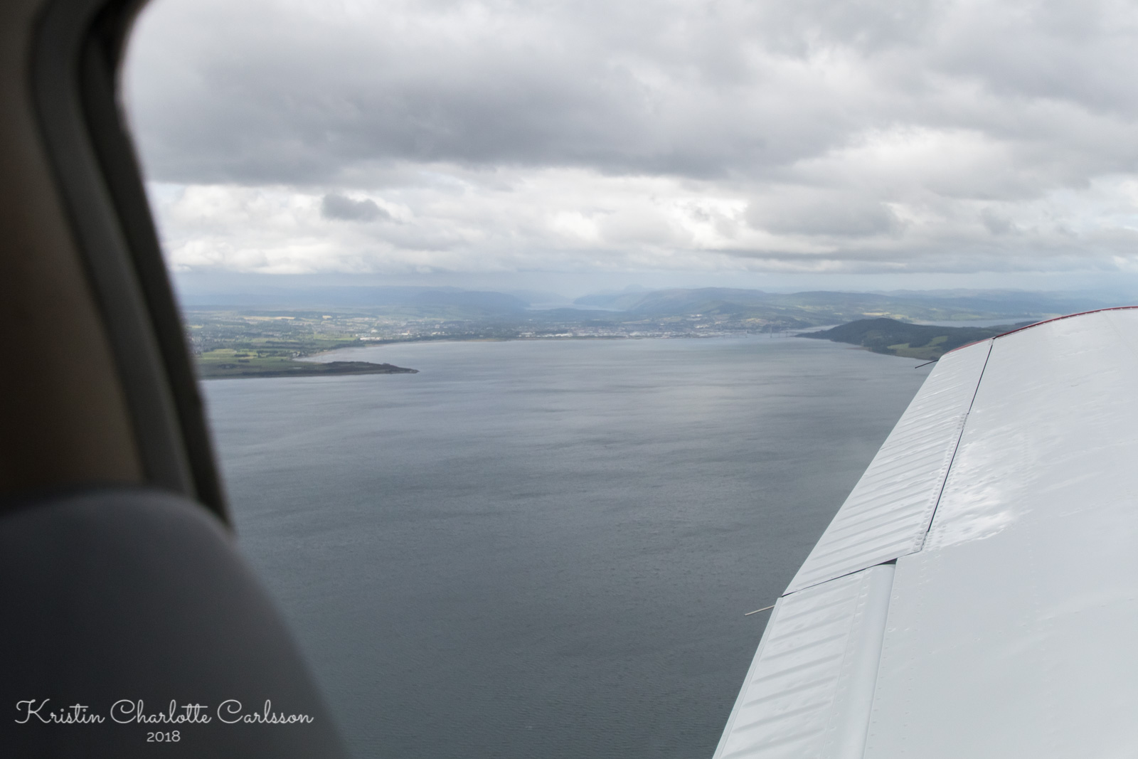 Inverness innerst i fjorden med Loch Ness i bakgrunnen. Ingen sjøormer i sikte!